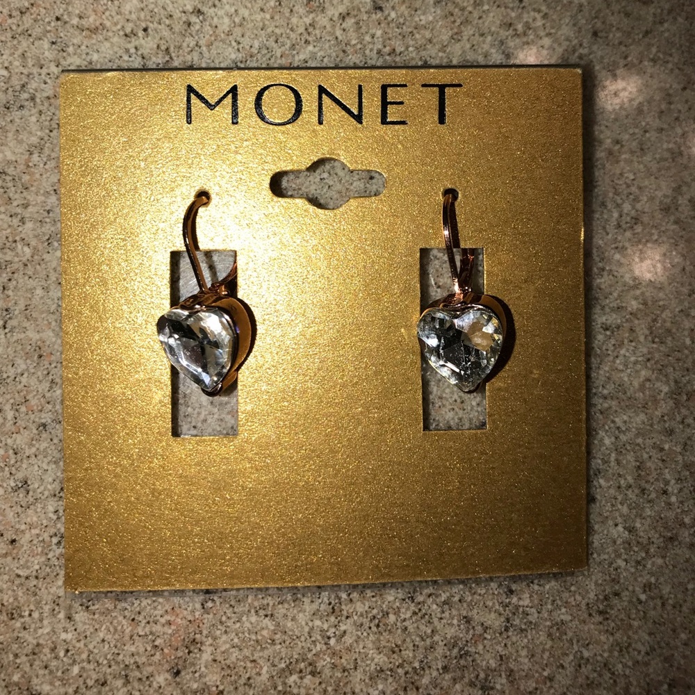 Earrings never worn. Heart shaped. Soft rose gold